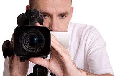 image of a man with a video camera